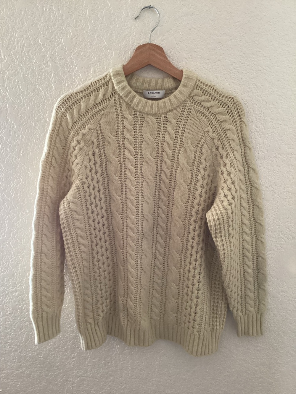 Aritzia Babaton cream cable-knit fisherman sweater